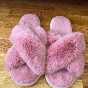 Pink fuzzy slippers